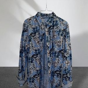 A blue floral button shirt in blue size medx40